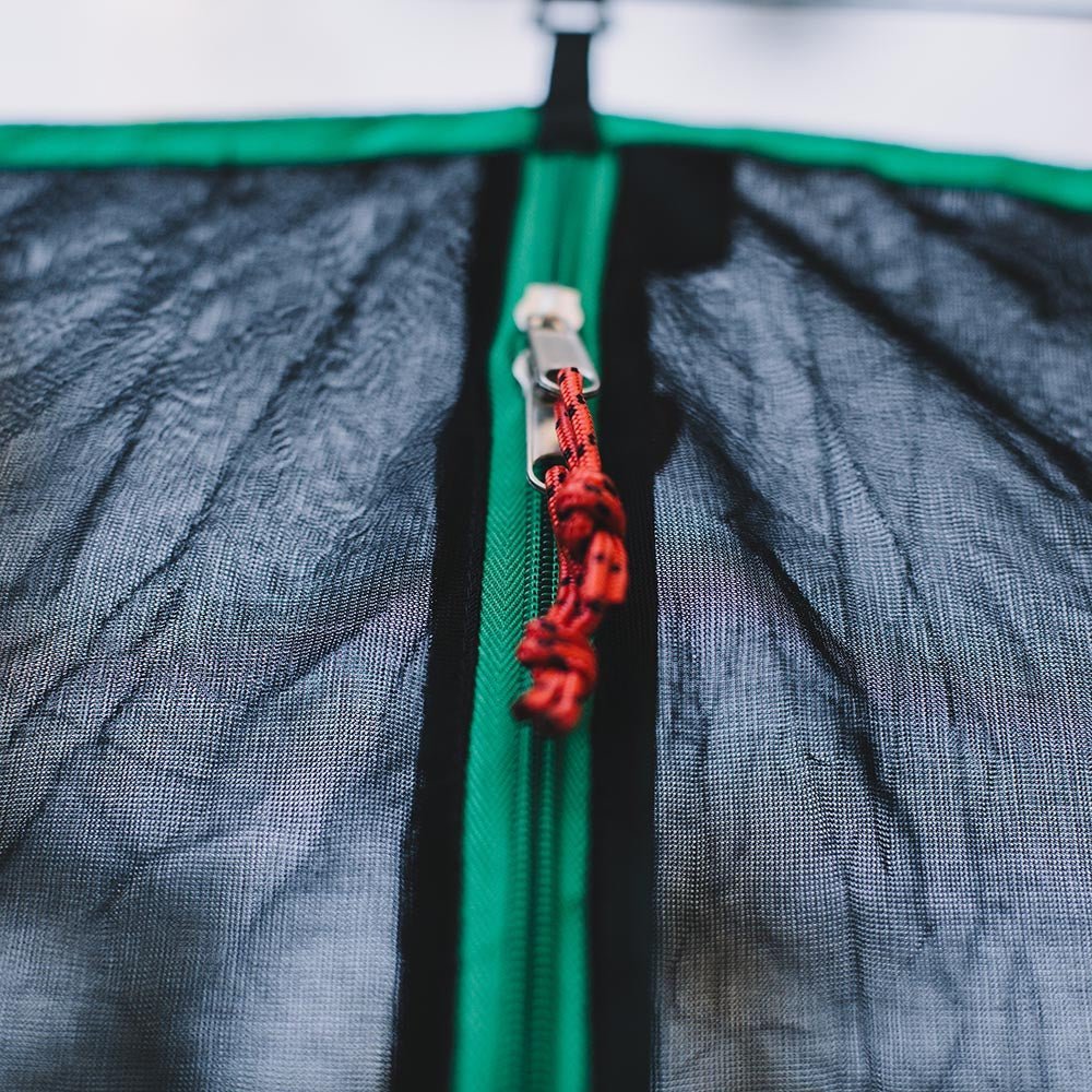 Keep bugs away while hiking using a hammock bug net.