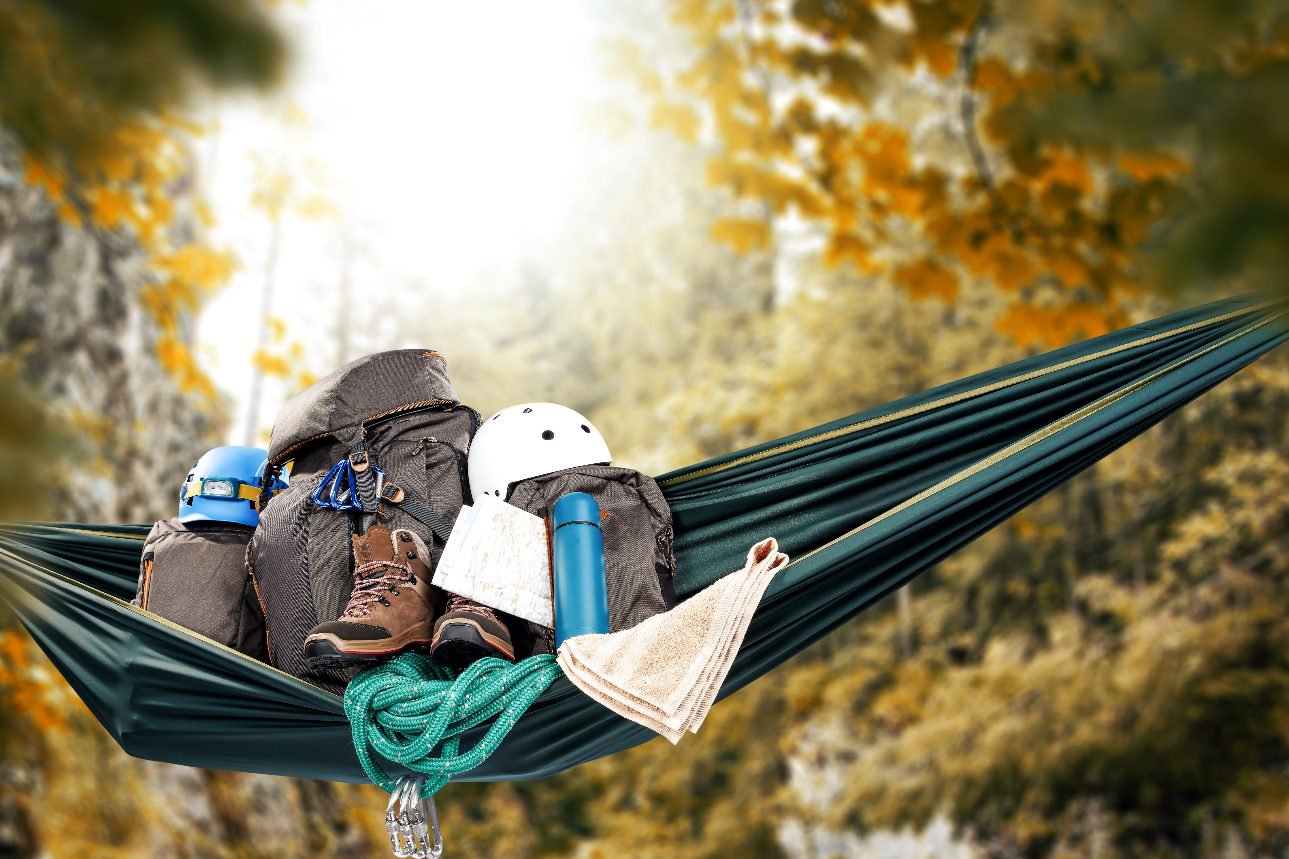 camping-gear-on-a-camping-hammock-in-the-forest-in-fall