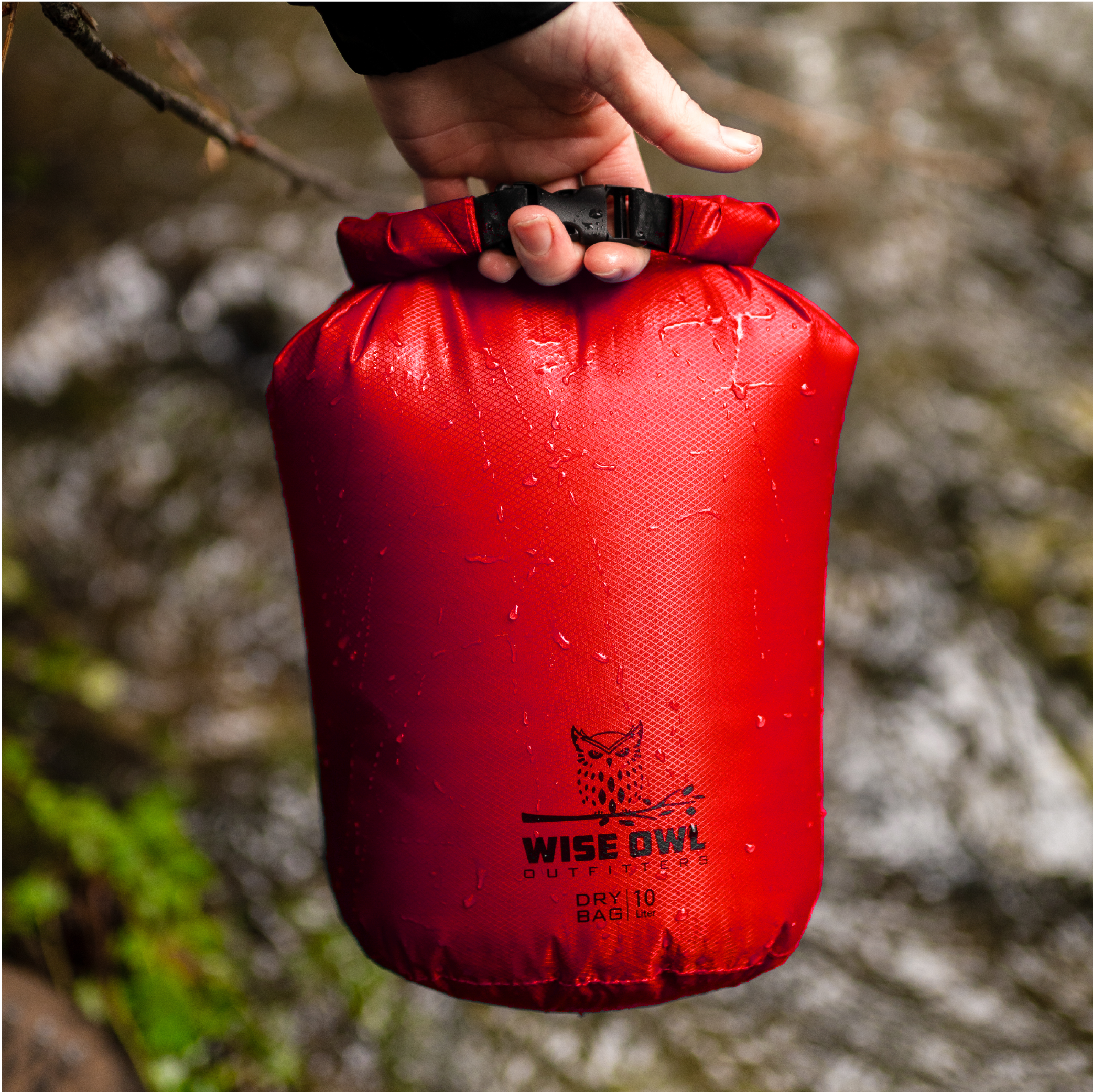 Red Dry Bag covered in water