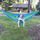 Kid in a Kelly Green & Cobalt Blue hammock