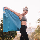 Woman with Marine Blue Camping Towel