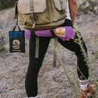 Purple Camping Towel under Backpack