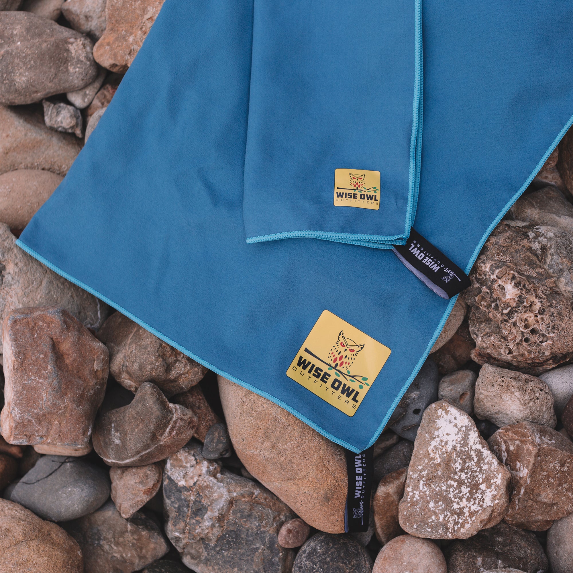 Royal Blue Camping Towel on Rocks