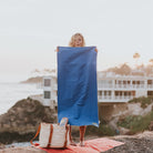 Woman holding Royal Blue Camping Towel