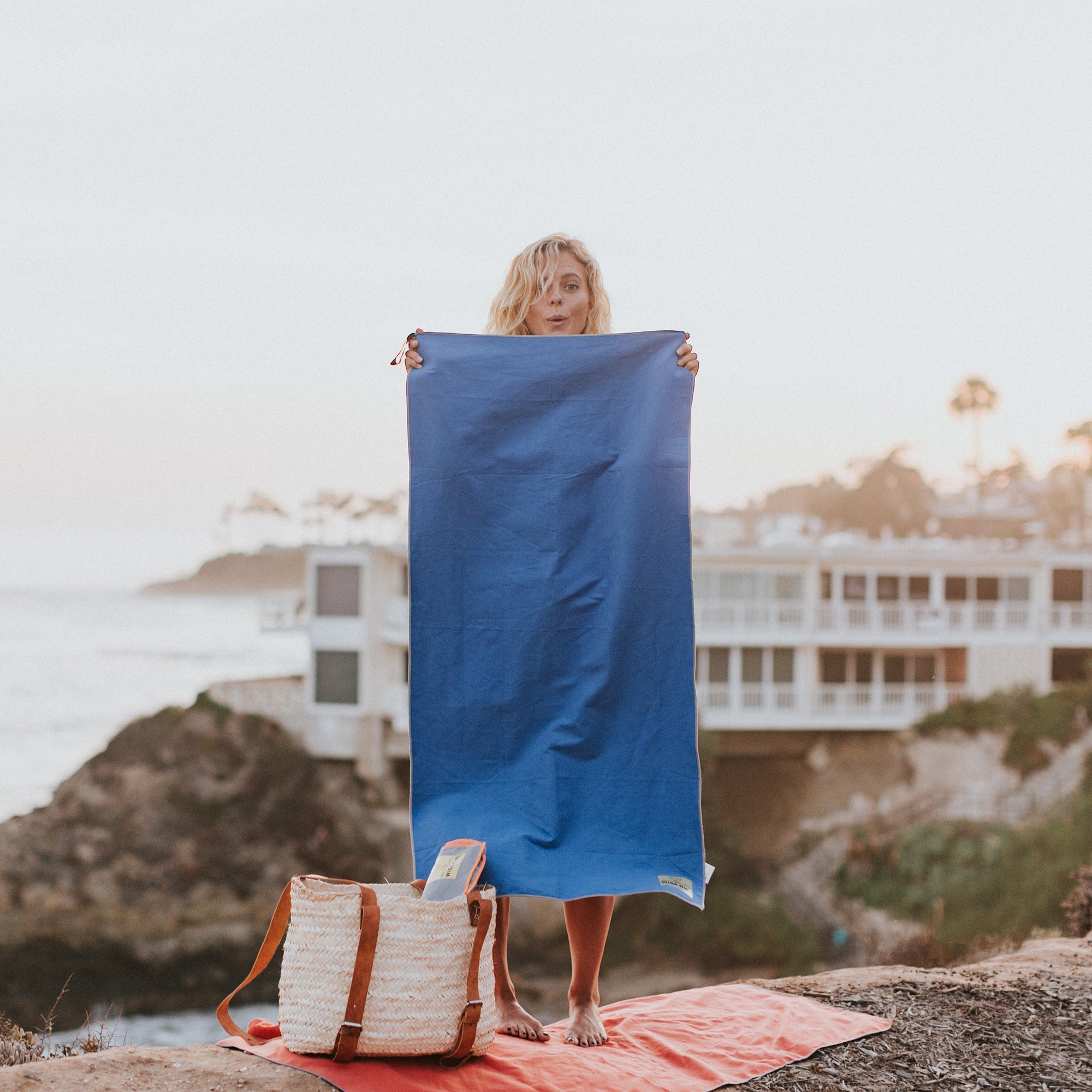 Woman holding Royal Blue Camping Towel