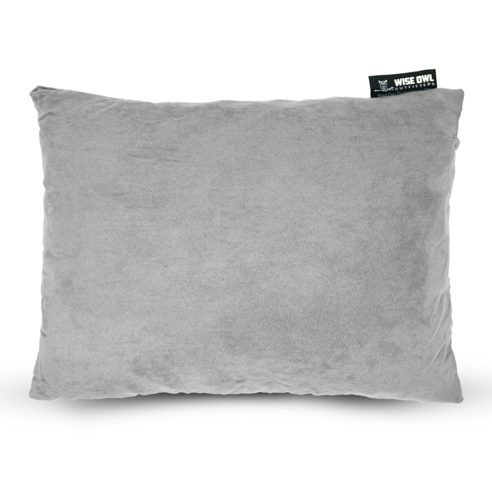 Use a camping pillow to sleep while camping.