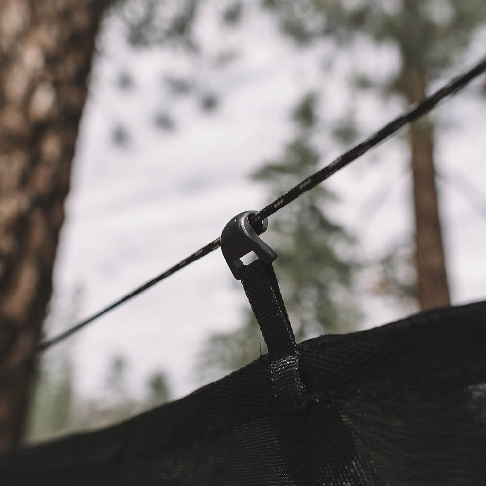 Keep bugs out using a hammock bug net with your camping hammock.